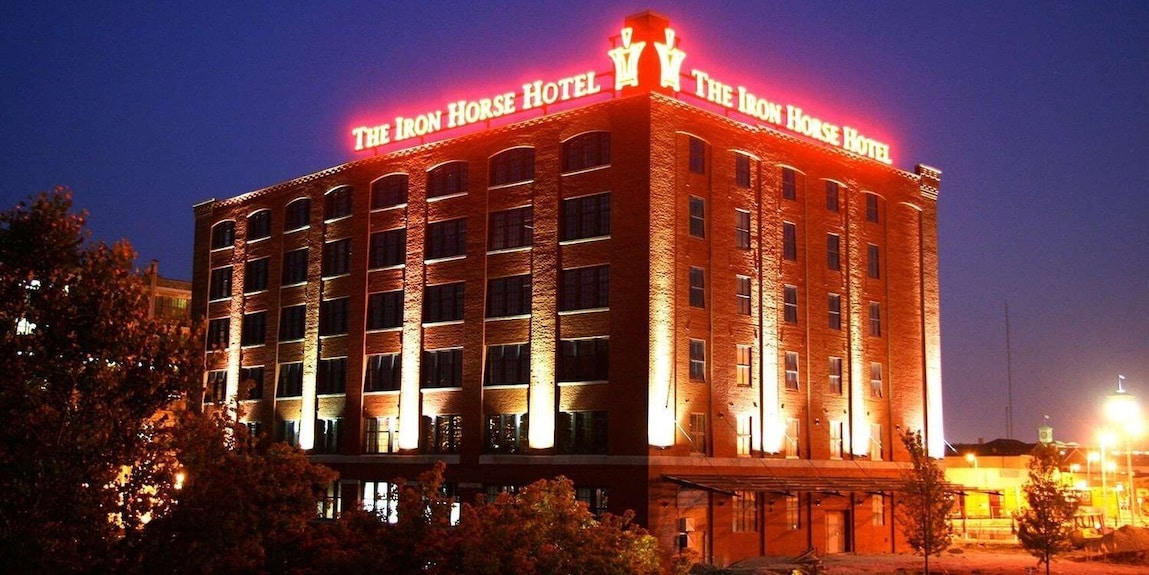 The Iron Horse Hotel Milwaukee at night with iconic sign